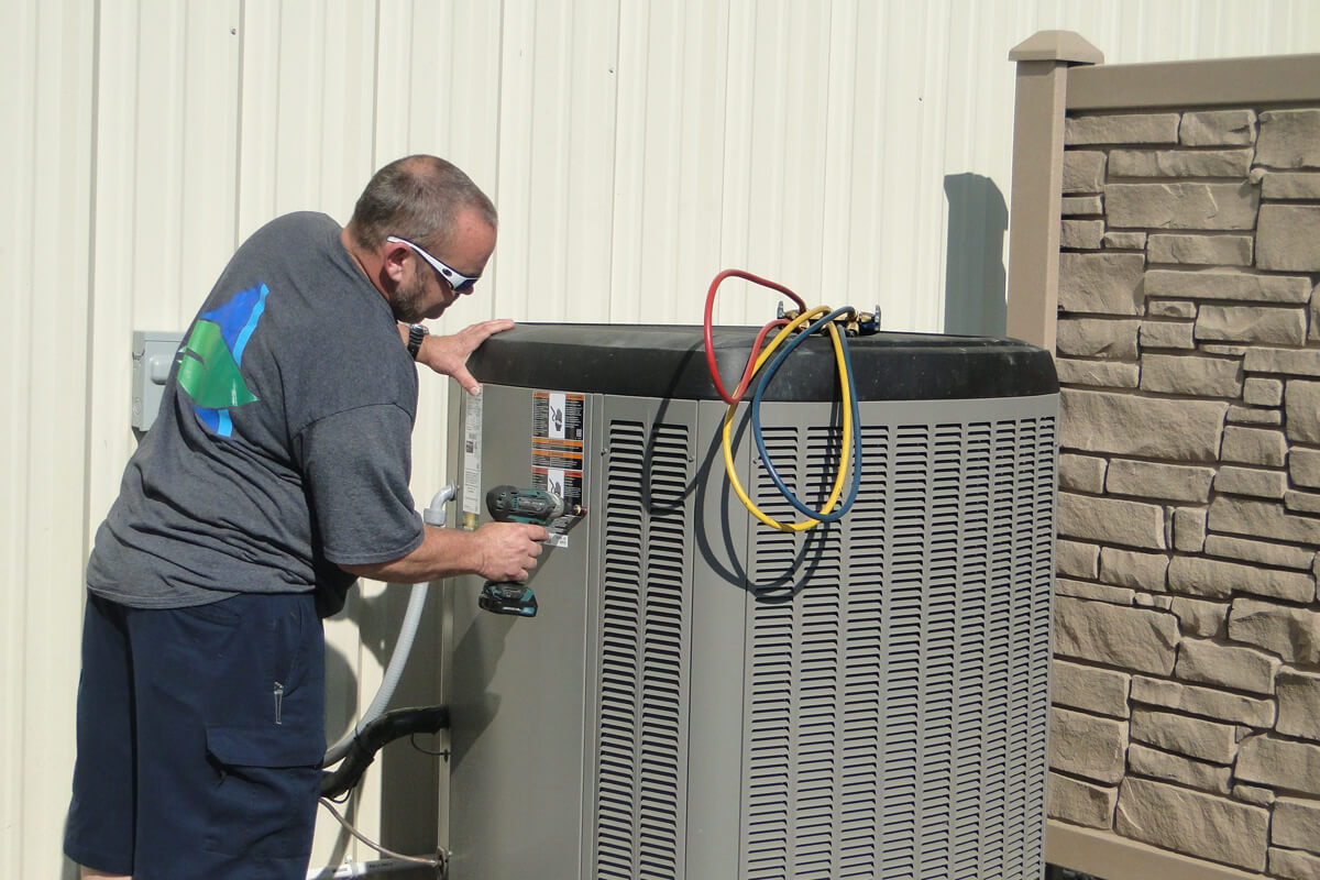 Worker Working on Lennox Unit